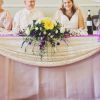 Hitchin Priory top table wedding breakfast cascade flower arrangement