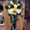 wedding church venue pew ends flowers arrangements
