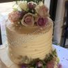 The Dairy Waddesdon Manor wedding venue vintage theme buttercream cake flow