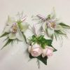 white cymbidium orchid buttonholes and pink rose corsage