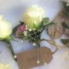 The Dairy Waddesdon Manor wedding venue groom rose boutonniere buttonhole