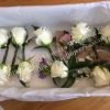 The Dairy Waddesdon Manor wedding venue rose buttonholes and hair comb