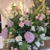 Notley Abbey wedding venue large pedestal arrangement blush pink white ivor