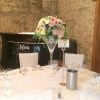 Notley Abbey wedding venue tall martini glass table centrepiece blush pink 