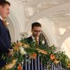 Missenden Abbey jamie at top of staircase with bannister flowers 10 18